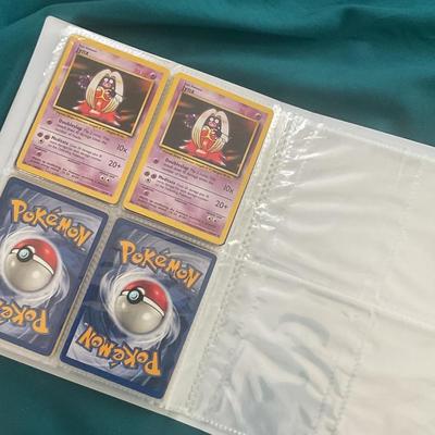 Binder of 100 Pokemon Cards, many Holos