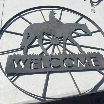 Metal art horse welcome sign