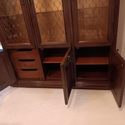 TRIPLE LIGHTED CHINA HUTCH W/3 DOORS ON TOP AND 3 ON THE BOTTOM PLUS 3 DRAWERS