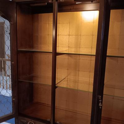 TRIPLE LIGHTED CHINA HUTCH W/3 DOORS ON TOP AND 3 ON THE BOTTOM PLUS 3 DRAWERS
