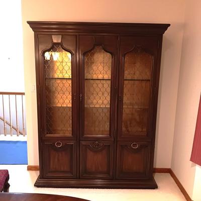 TRIPLE LIGHTED CHINA HUTCH W/3 DOORS ON TOP AND 3 ON THE BOTTOM PLUS 3 DRAWERS