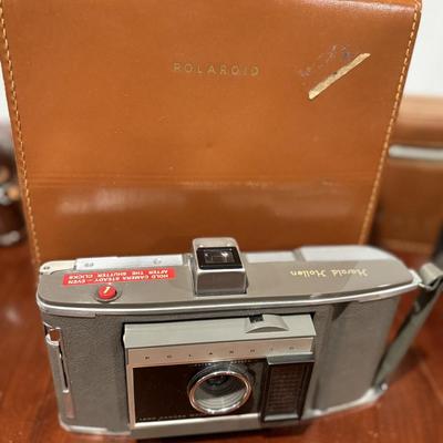 Vintage Polaroid camera and case