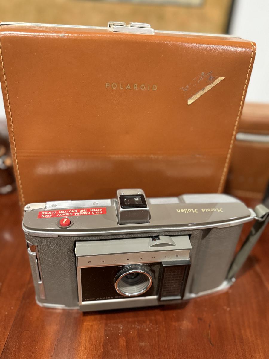 Vintage Polaroid camera and case