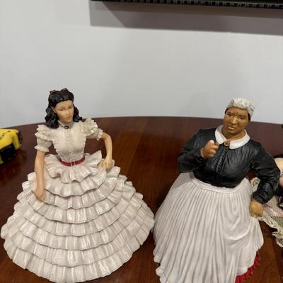 Two porcelain Gone with the Wind figurines and one Scarlett O’Hara doll