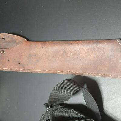 Concealed Firearm fanny pack - leather Knife sheath - and a leather field custom rifle sling
