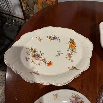 Four pretty plates/platters