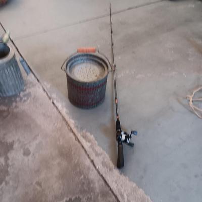 FALLS CITY GALVANIZED MINNOW PAIL AND A BERKLEY FISHING POLE W/REEL
