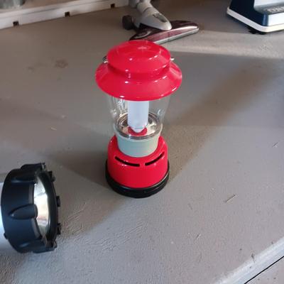 BATTERY OPERATED COLEMAN LANTERN & A RECHARGEABLE FLASHLIGHT