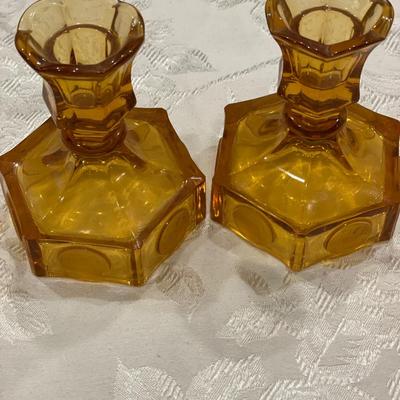 2 amber coin glass candle holders