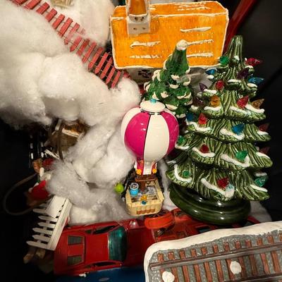 Train village with Lionel trains, houses and more!