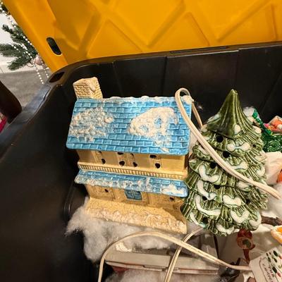 Train village with Lionel trains, houses and more!