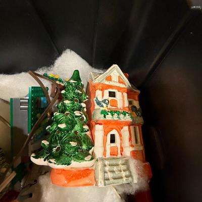 Train village with Lionel trains, houses and more!