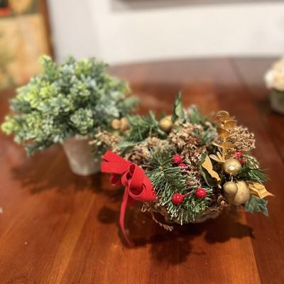 One candle decor and three faux flower arrangements