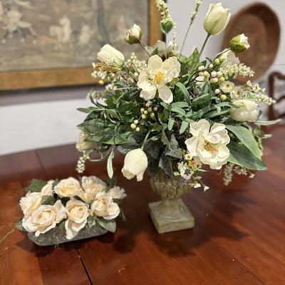 Two pretty white faux flower arrangements