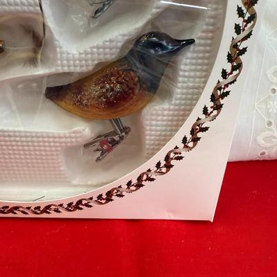 Feathered bird ornament