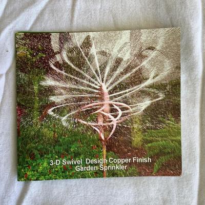 G8133 New in box 3-D Swivel Design Copper Finish Garden sprinkler