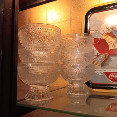 12 TIARA GLASS DESSERT PEDESTAL BOWLS AND A TIN COCA-COLA TRAY