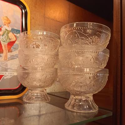 12 TIARA GLASS DESSERT PEDESTAL BOWLS AND A TIN COCA-COLA TRAY