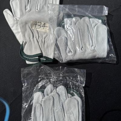 three pair, small, medium and large leather gloves