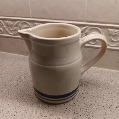 LE CREUSET BAKING DISH AND A SMALL CLAY PITCHER