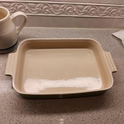 LE CREUSET BAKING DISH AND A SMALL CLAY PITCHER