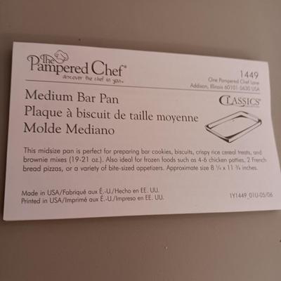 PAMPERED CHEF MEDIUM BAR PAN AND A CLAY CASSEROLE DISH