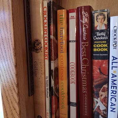 COOKBOOKS AND A PAIR OF BRASS DUCK BOOKENDS