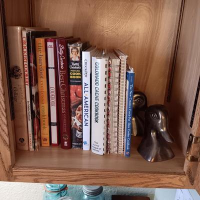 COOKBOOKS AND A PAIR OF BRASS DUCK BOOKENDS