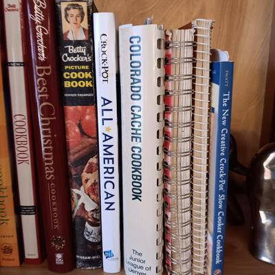 COOKBOOKS AND A PAIR OF BRASS DUCK BOOKENDS
