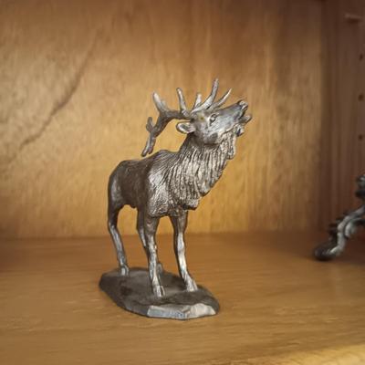 A PAIR OF BRASS DUCK HEAD BOOKENDS AN A PEWTER ELK
