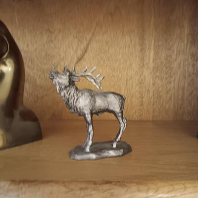 A PAIR OF BRASS DUCK HEAD BOOKENDS AN A PEWTER ELK
