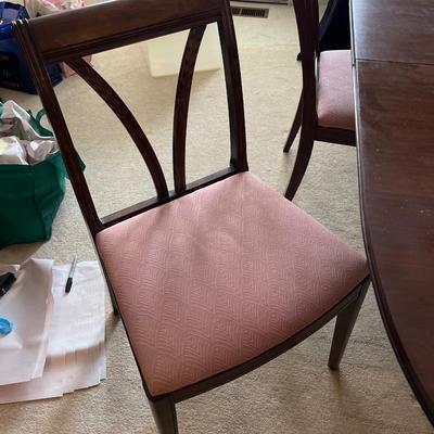 Table, six chairs with three leaves & pads