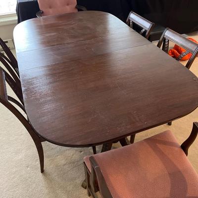 Table, six chairs with three leaves & pads