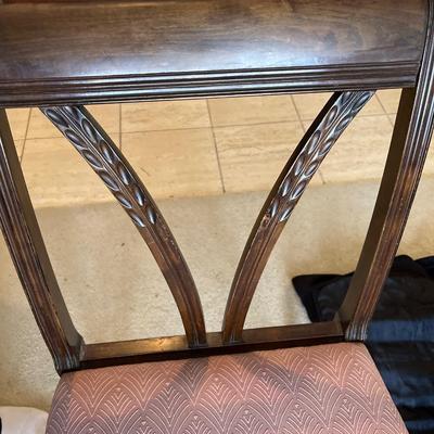 Table, six chairs with three leaves & pads