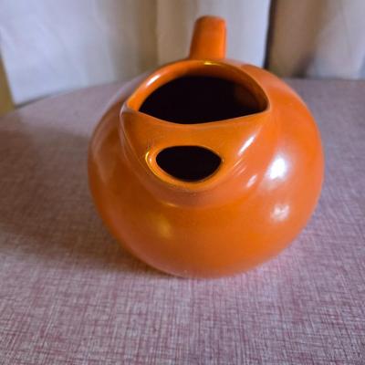 Vintage orange water pitcher