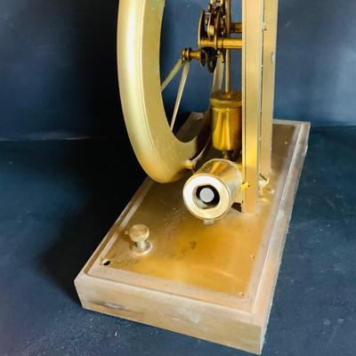 LOT 308: Vintage Junghans Brass Clock