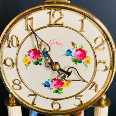 LOT 309: German Kern Anniversary Clock with Enamel Face and Base with Porcelain Figures and Vintage 8 Day Clock with German Figures on...