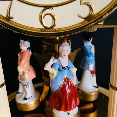 LOT 309: German Kern Anniversary Clock with Enamel Face and Base with Porcelain Figures and Vintage 8 Day Clock with German Figures on...