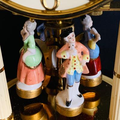 LOT 309: German Kern Anniversary Clock with Enamel Face and Base with Porcelain Figures and Vintage 8 Day Clock with German Figures on...