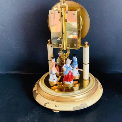 LOT 309: German Kern Anniversary Clock with Enamel Face and Base with Porcelain Figures and Vintage 8 Day Clock with German Figures on...