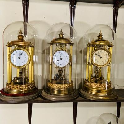 LOT 318: Set of Three (3) Large 400 Day Brass Anniversary Clocks