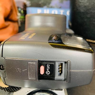 LOT 394: Assortment of Digital Cameras, Binoculars, Books and More