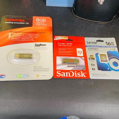 LOT 394: Assortment of Digital Cameras, Binoculars, Books and More