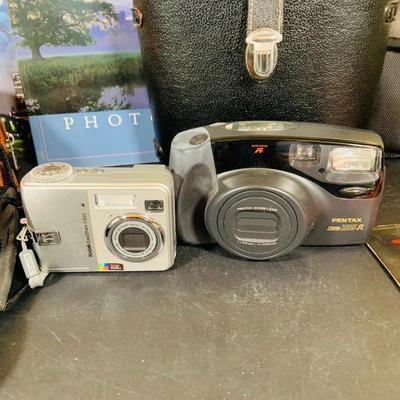 LOT 394: Assortment of Digital Cameras, Binoculars, Books and More