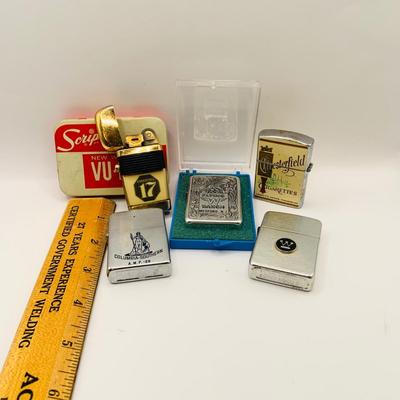 LOT 398: Assortment of Vintage Lighters by Zippo and Other and Scripto Tin Box