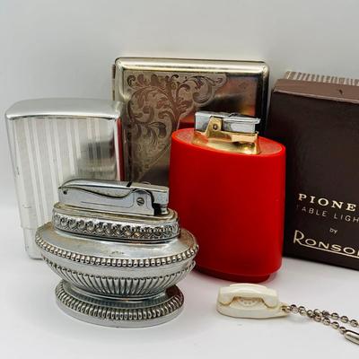 LOT 399: Red Robson Pioneer Table Lighter, Silver-tone Table Lighter Made in Japan, Cigarette Cases and More
