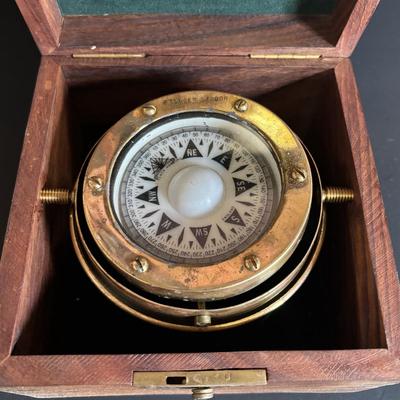 LOT 629: Brass Boston Ships Clock, C. Plath Hamburg Nautical Compass and Taylor Instruments Barometer