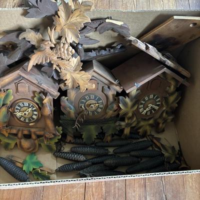 LOT 437: As Found Box of Cuckoo Clocks & Parts