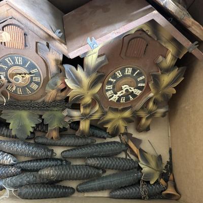LOT 437: As Found Box of Cuckoo Clocks & Parts
