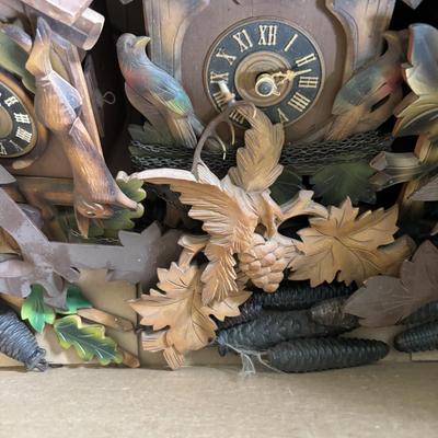 LOT 437: As Found Box of Cuckoo Clocks & Parts